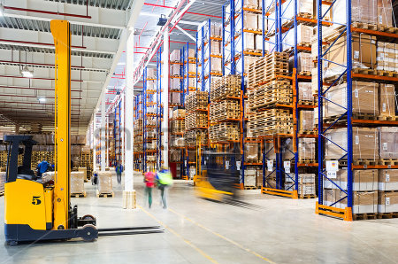 forklift in a busy warehouse