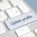 keyboard with key that says "update profile"