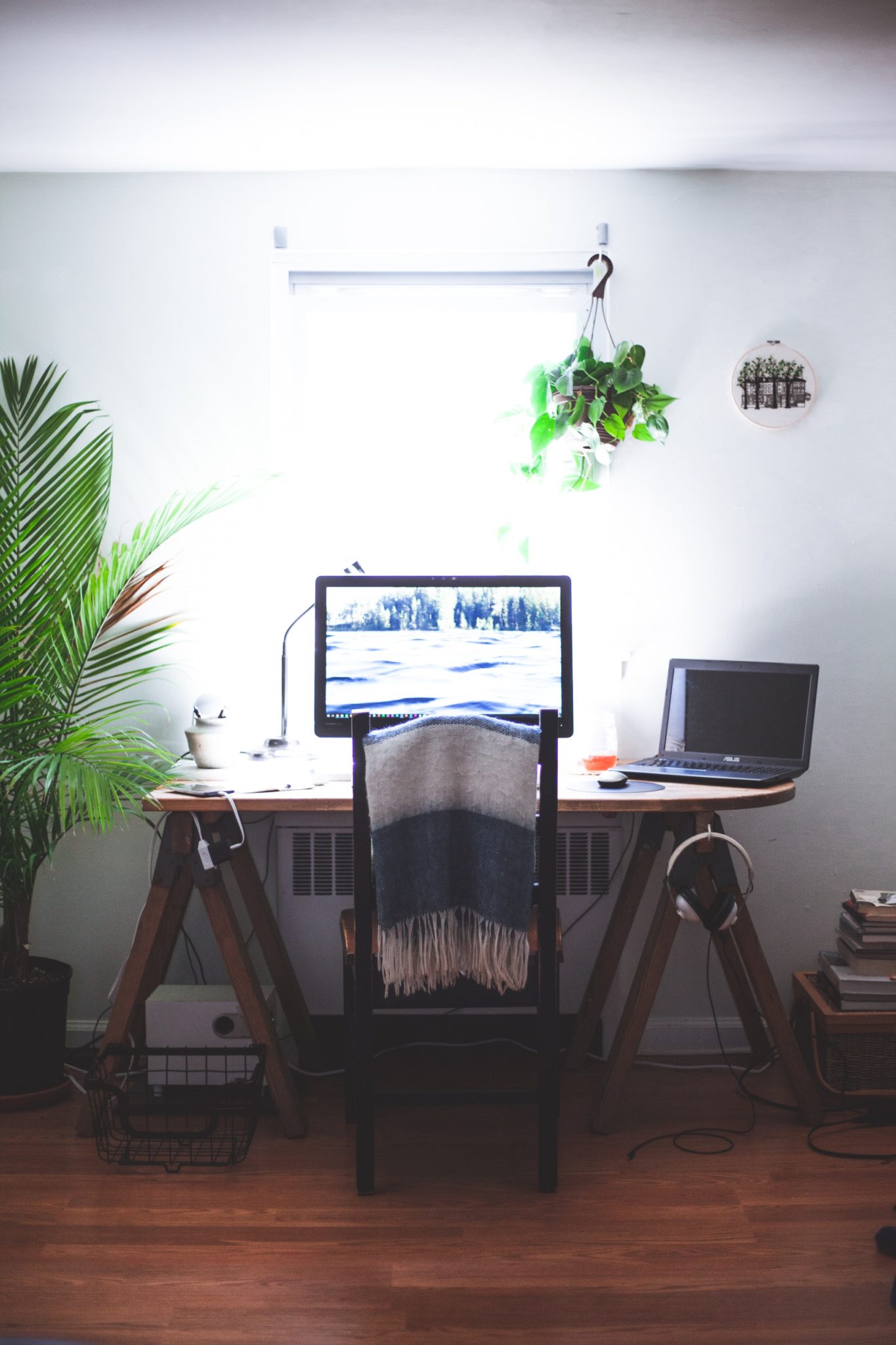 home office workspace with laptop and desk