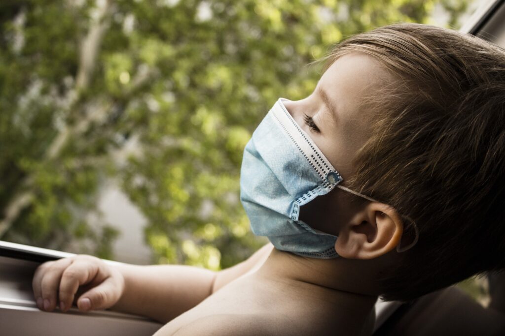 Toddler wearing medical mask